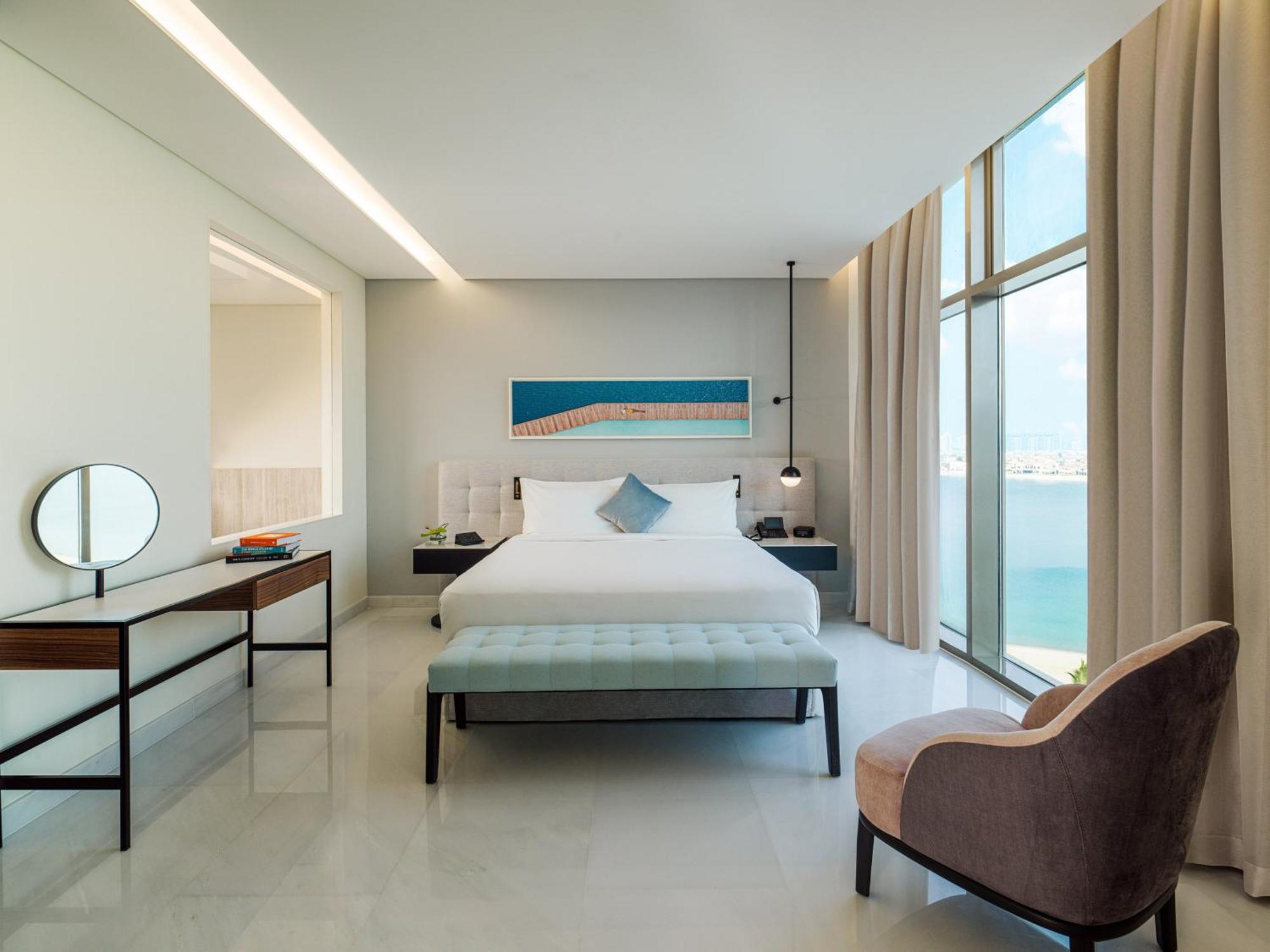 Th8 Palm Dubai Beach Resort, Vignette Collection By Ihg Eksteriør billede A bedroom at the hotel